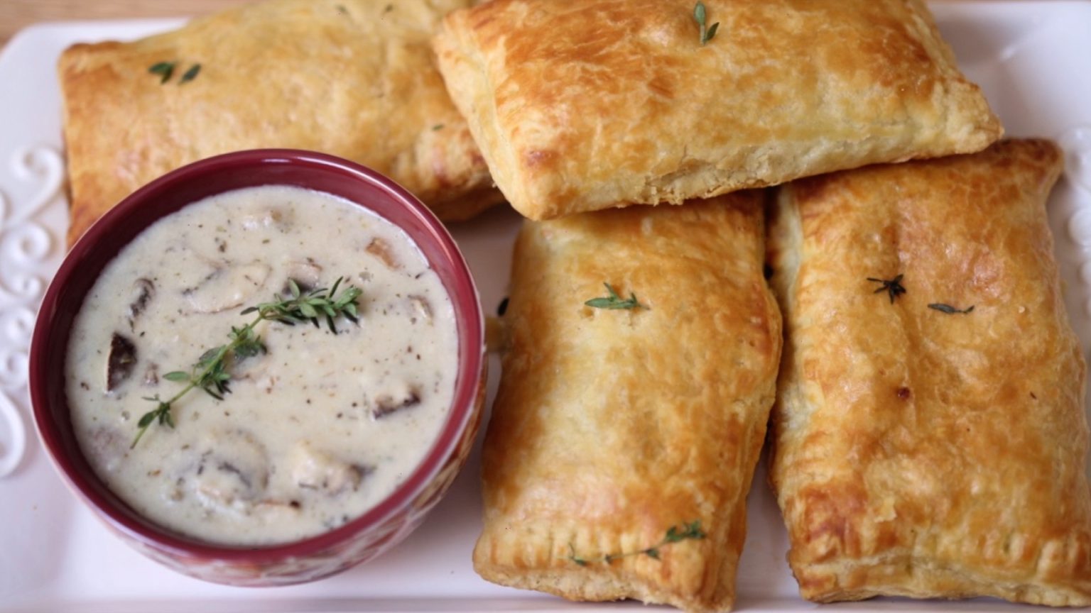 Mushroom puff pastries with a creamy dip